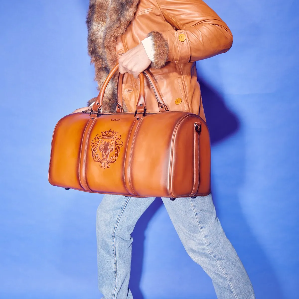 Embossed Lion Tan Leather Zip Closure Duffle Bag By Brune & Bareskin