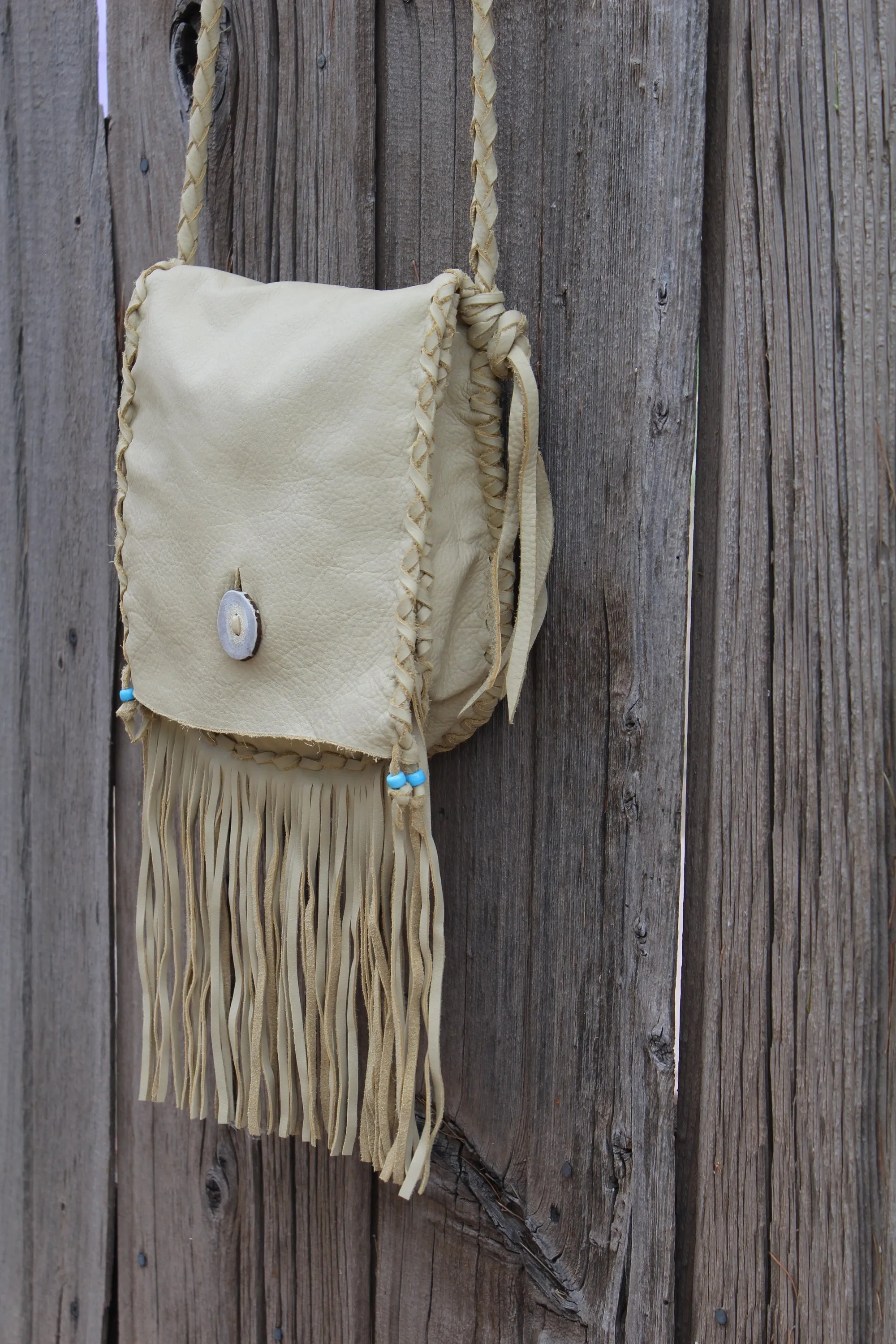 Fringed leather handbag, handstitched leather purse