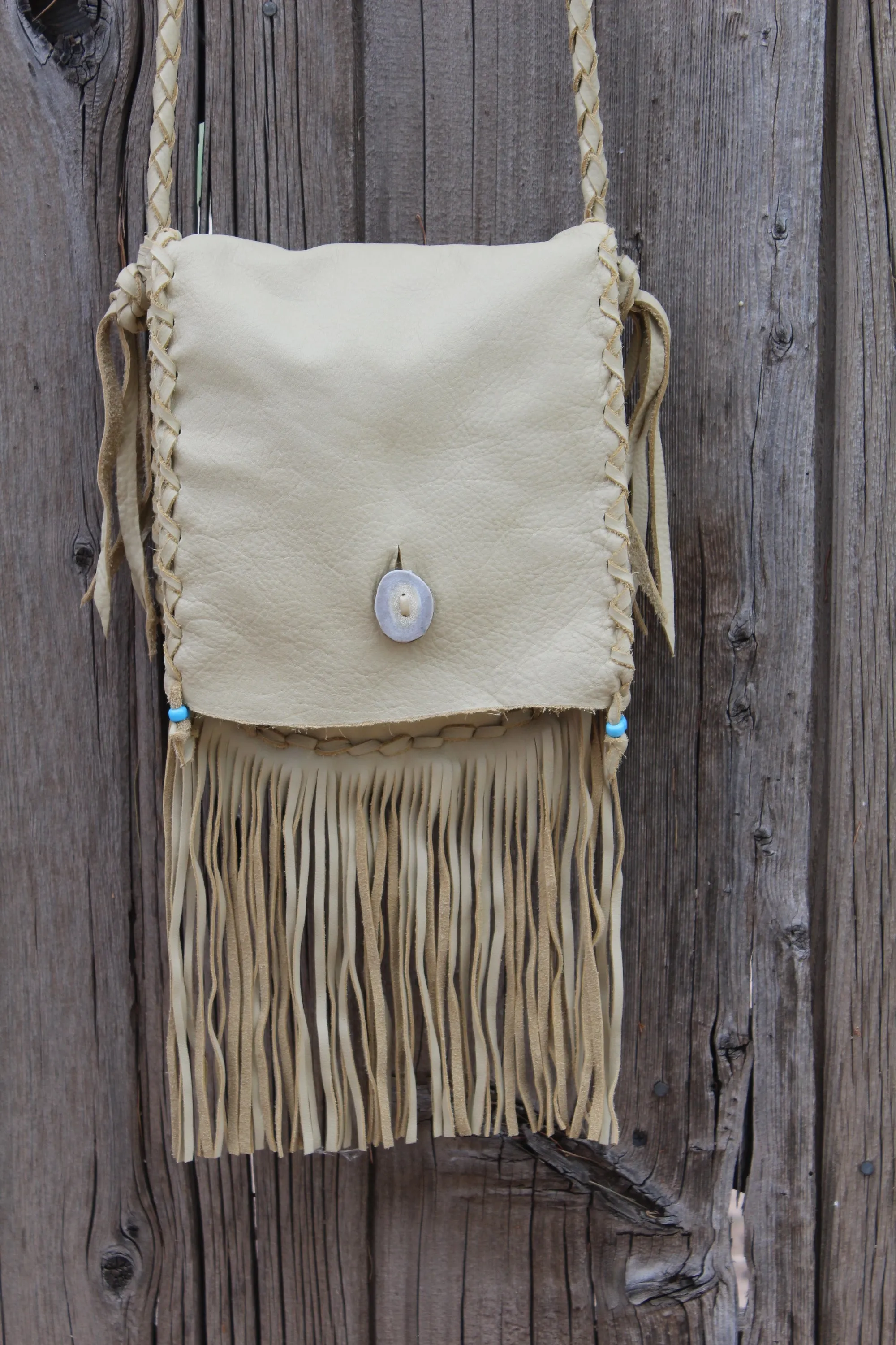 Fringed leather handbag, handstitched leather purse