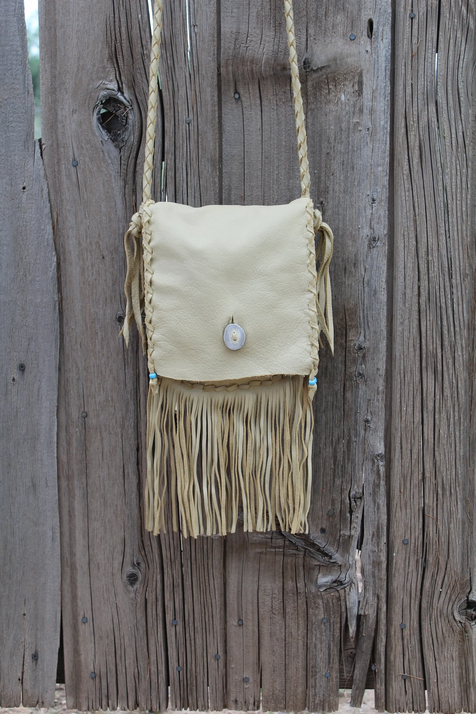 Fringed leather handbag, handstitched leather purse