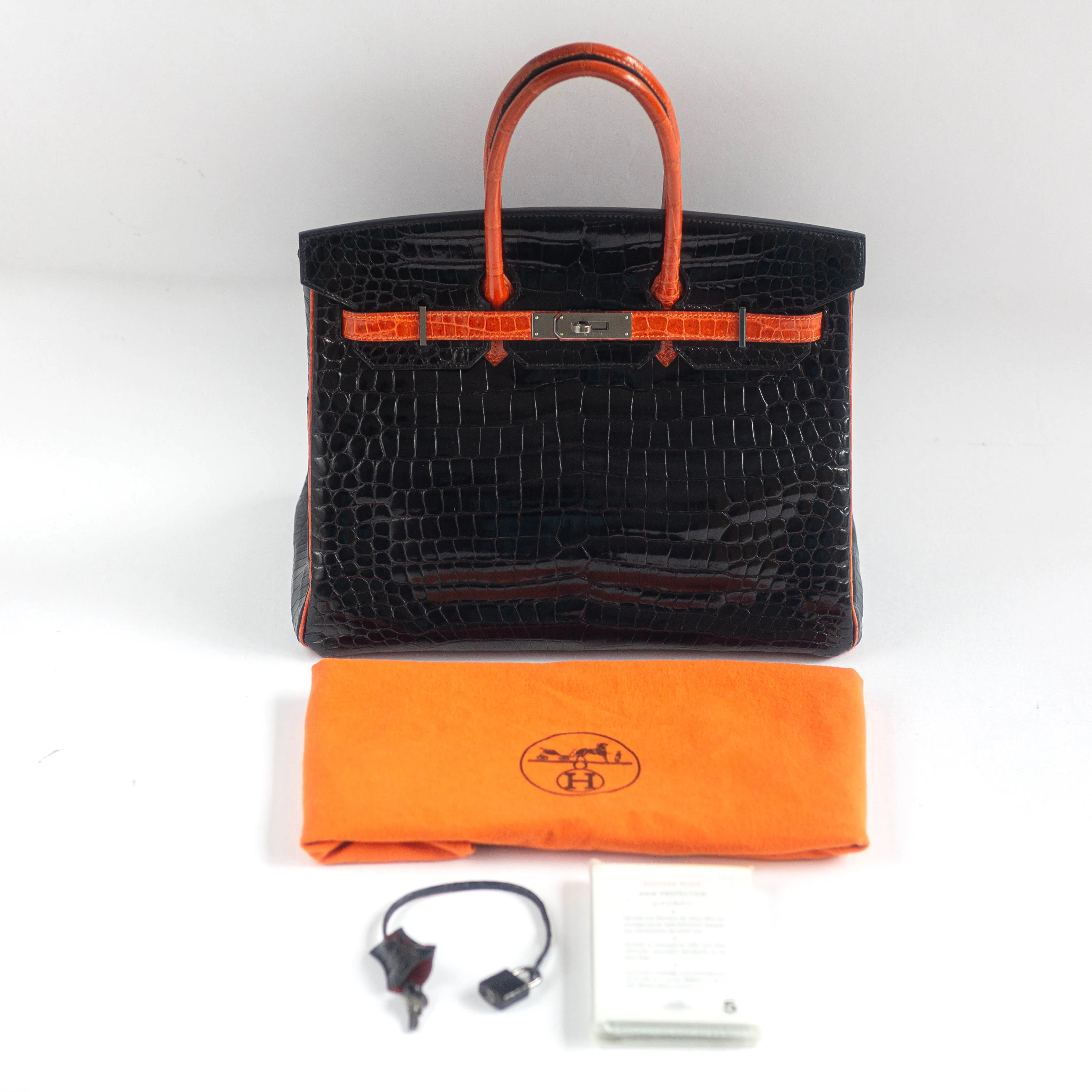 HERMÈS - BIRKIN 35 LIMITED EDITION HANDBAG IN BLACK AND ORANGE SHINY POROSUS CROCODILE WITH RUTHENIUM HARDWARE