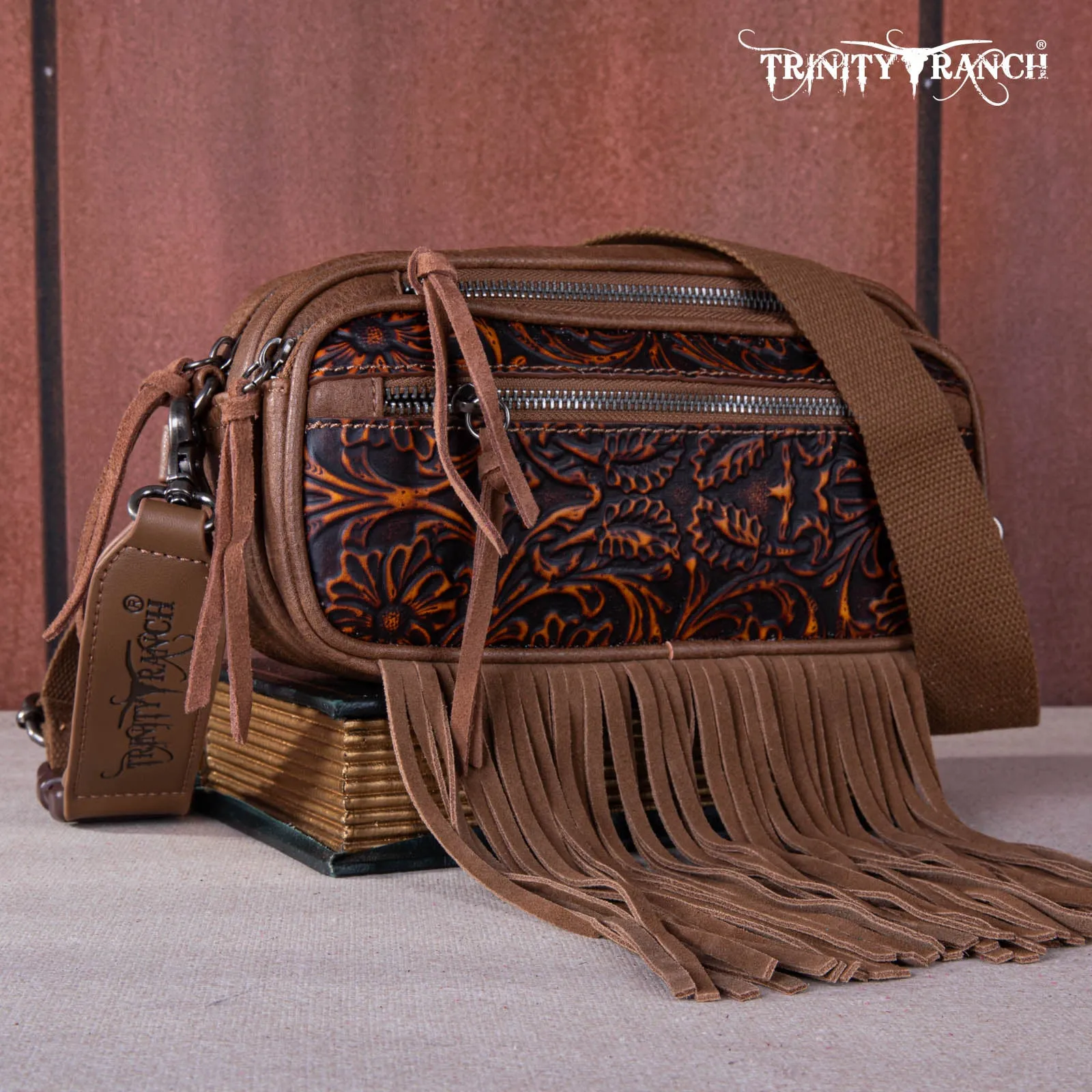 TR165-198  Trinity Ranch Floral Tooled Triple Zippered Pocket Fringe Belt Bag